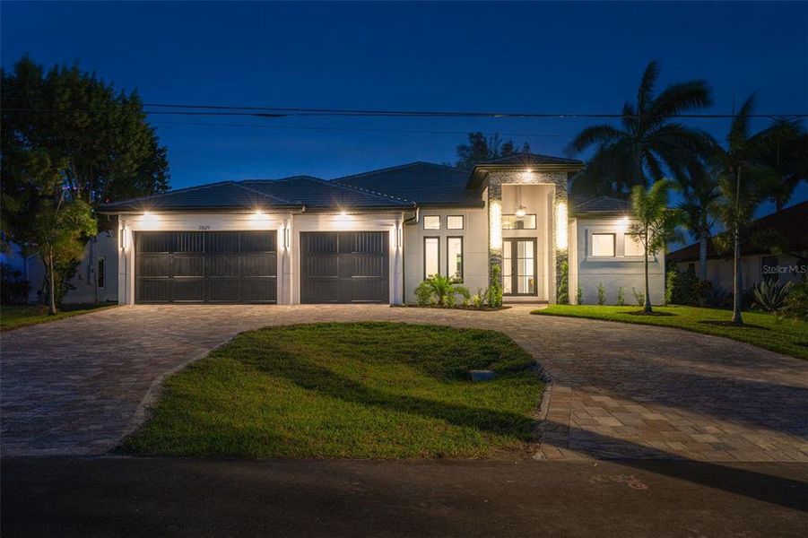 Front exterior of a new home in , Cape Coral, FL, highlighting curb appeal (Image 1).