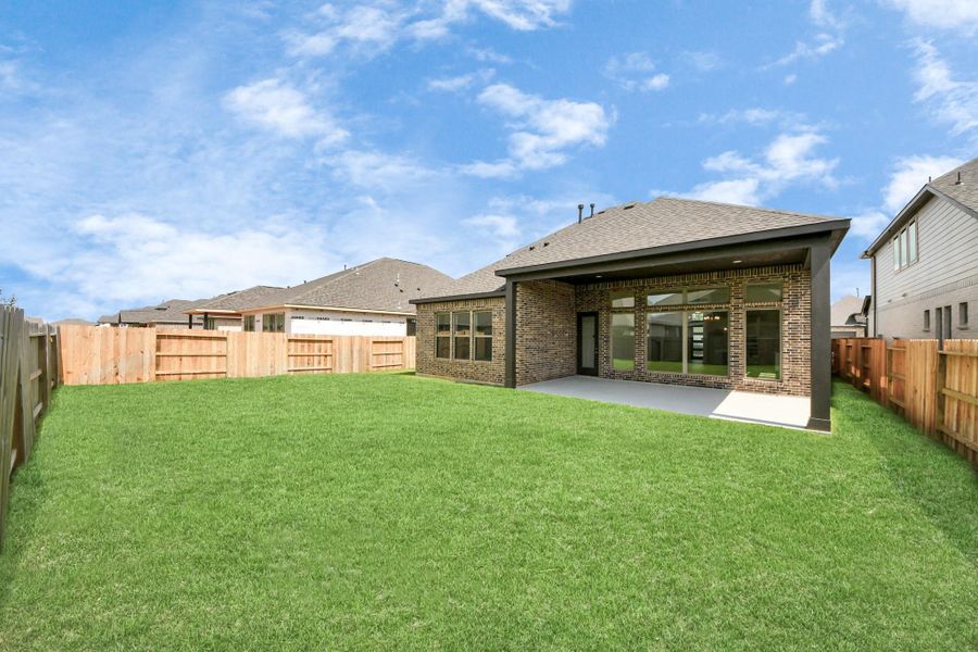 Front exterior of a new home in Marvida, Cypress, TX, highlighting curb appeal (Image 17).