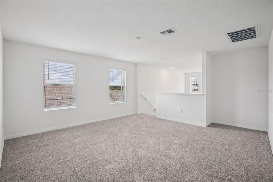 Spacious, unfurnished interior of a new home in Villamar - Classic Series, Winter Haven (Image 18).