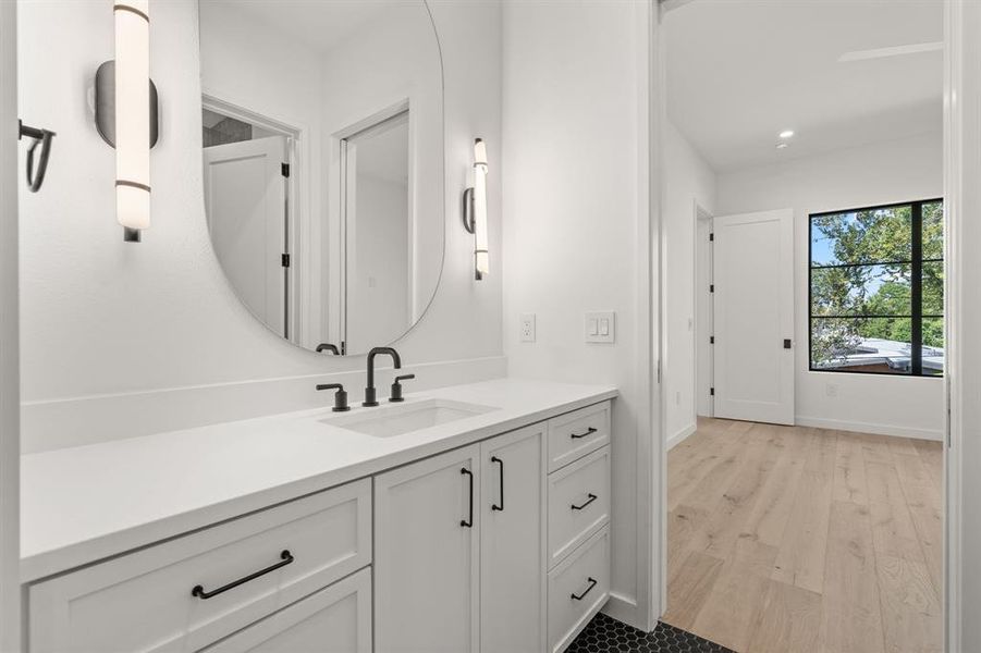 This bathroom is attached to bedroom #1 but also has access to the hallway and second floor living area.