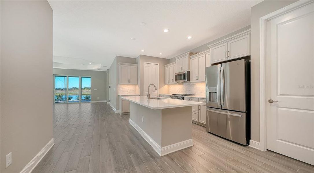 Furnished interior view inside a new home in Palm Grove, Lakewood Ranch (Image 9).