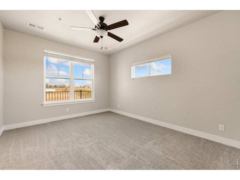 Spacious, unfurnished interior of a new home in The Lakes at Centerra, Loveland (Image 42). Spacious, unfurnished interior of a new home in The Lakes at Centerra, Loveland (Image 42).