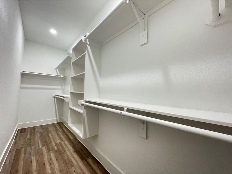 Primary walk in closet Primary walk in closet