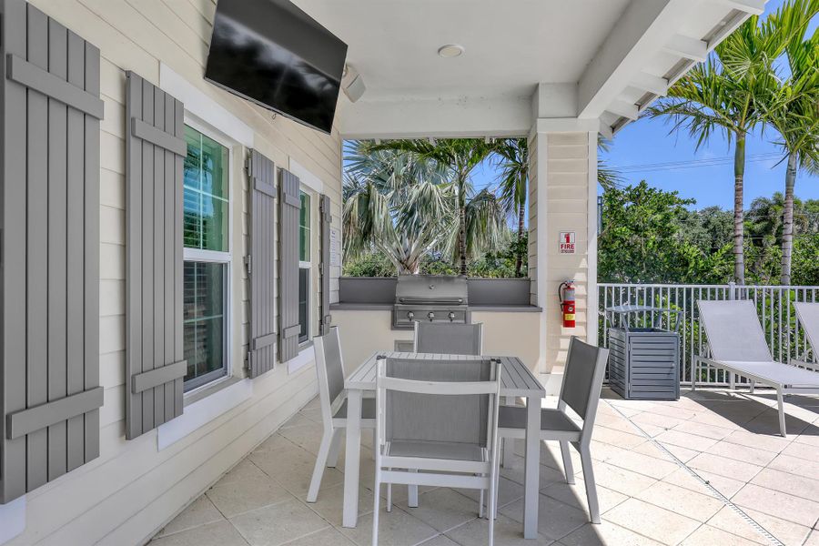 Exterior details and patio area of a home in The Reserve at Tequesta, Tequesta (Image 2).
