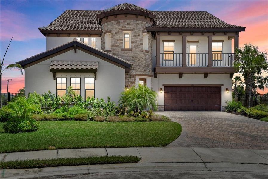 Front exterior of a new home in Crosswind Ranch, Parrish, FL, highlighting curb appeal (Image 28).