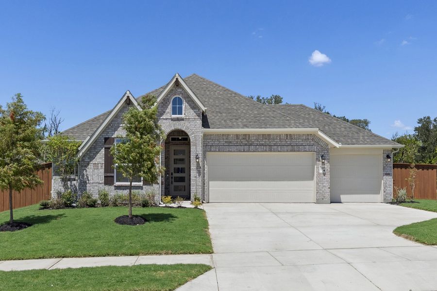 Front exterior of a new home in Heartland, Heartland, TX, highlighting curb appeal (Image 1). Front exterior of a new home in Heartland, Heartland, TX, highlighting curb appeal (Image 1).