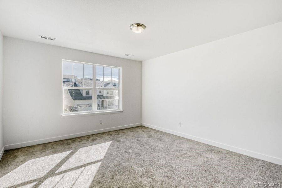 Spacious, unfurnished interior of a new home in Newlin Crossing, Parker (Image 11).
