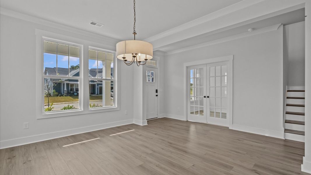 Highly skilled layout highlights this modern dining room in a desirable location