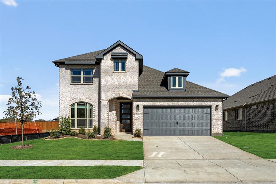 Front exterior of a new home in Creekview Meadows, Pilot Point, TX, highlighting curb appeal (Image 1).