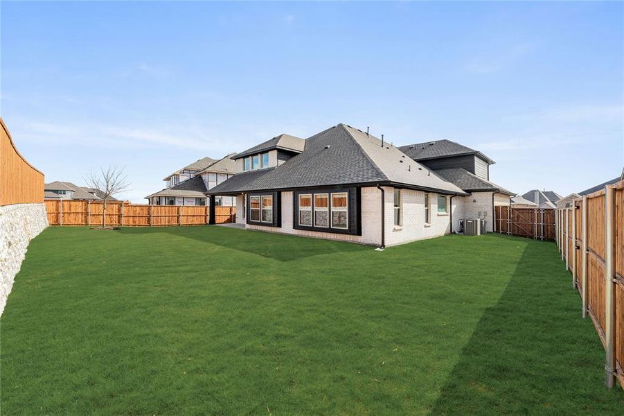 Exterior details and patio area of a home in Sutton Fields, Celina (Image 3).