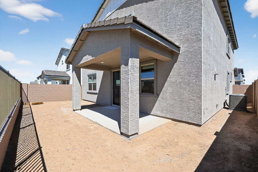 Exterior details and patio area of a home in Artisan at Asante, Surprise (Image 4).