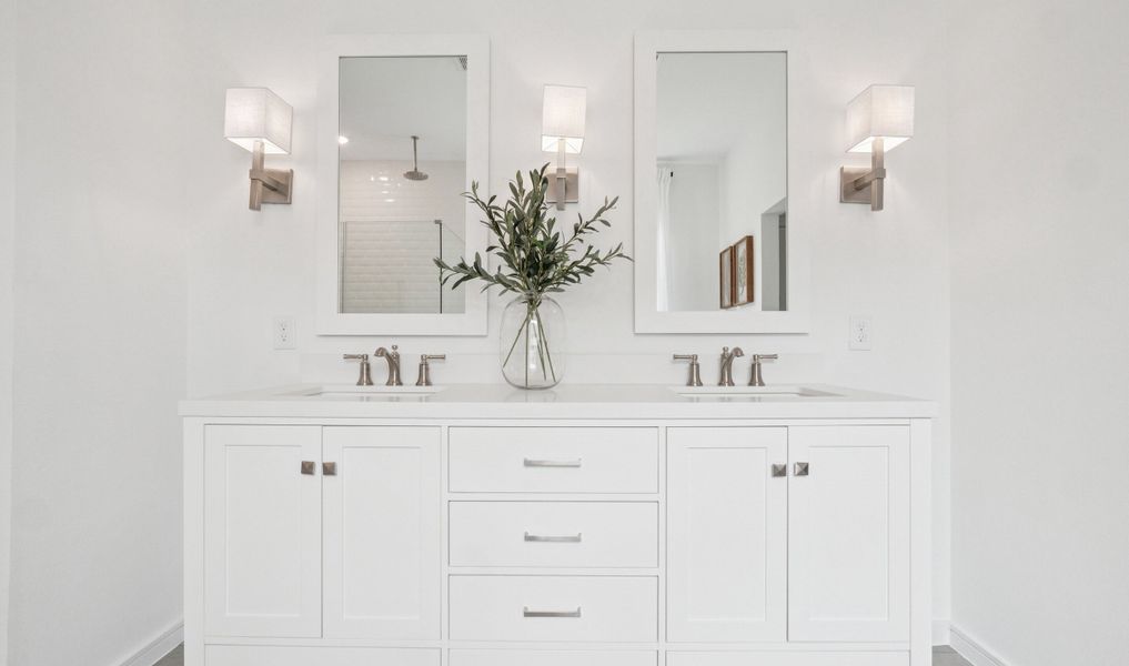 Primary bath features freestanding vanity with dual sinks Primary bath features freestanding vanity with dual sinks