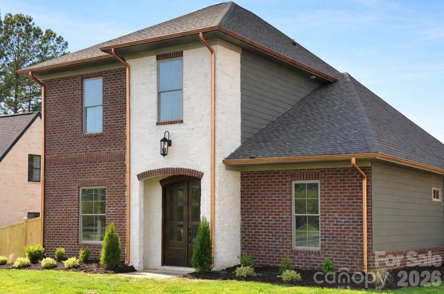 Exterior details and patio area of a home in , Matthews (Image 4). Exterior details and patio area of a home in , Matthews (Image 4).