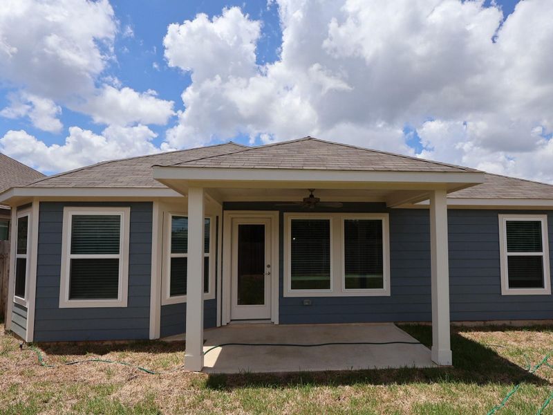 Exterior details and patio area of a home in Magnolia Ridge, Magnolia (Image 22).