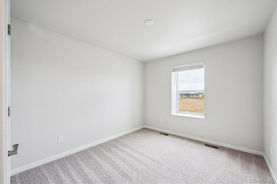 Spacious, unfurnished interior of a new home in Legato, Commerce City (Image 19).