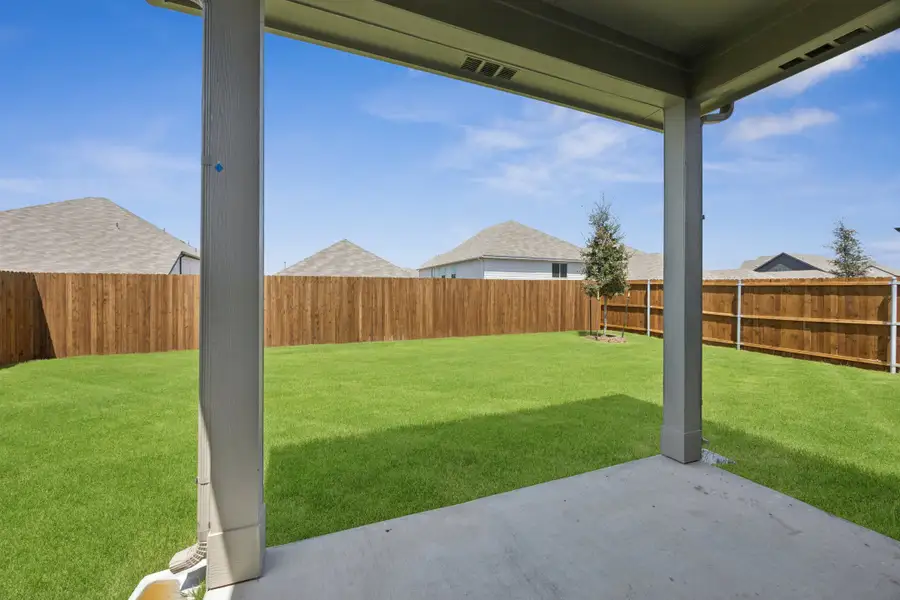 Covered Patio in the Haylee home plan by Trophy Signature Homes - REPRESENTATIVE PHOTO Covered Patio in the Haylee home plan by Trophy Signature Homes - REPRESENTATIVE PHOTO