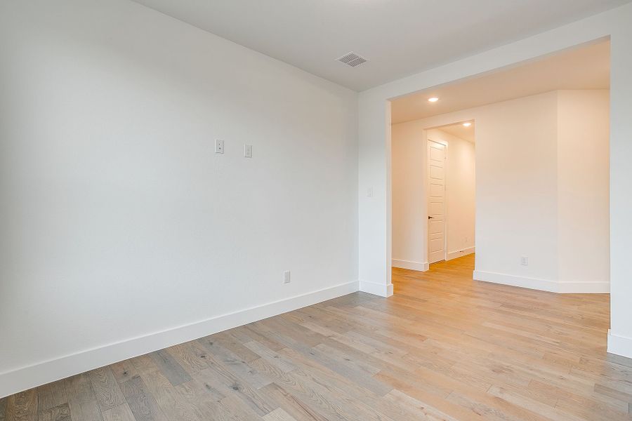 Representative unfurnished interior of a home built from the Valera by Graham Hart Home Builder in Bear Ridge, Burleson (Image 26).