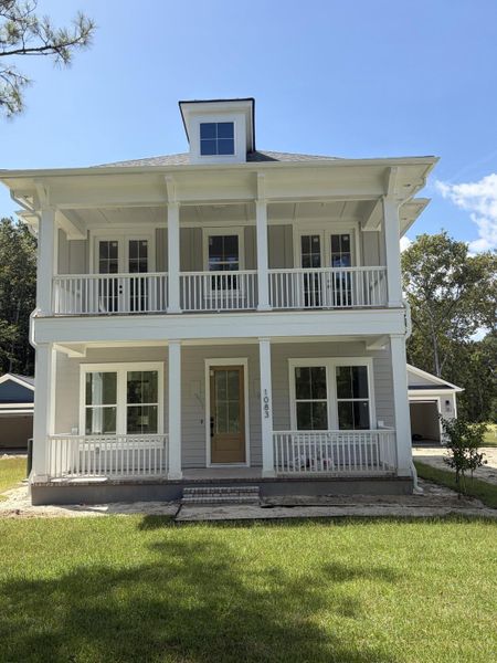 Exterior details and patio area of a home in , Awendaw (Image 6). Exterior details and patio area of a home in , Awendaw (Image 6).