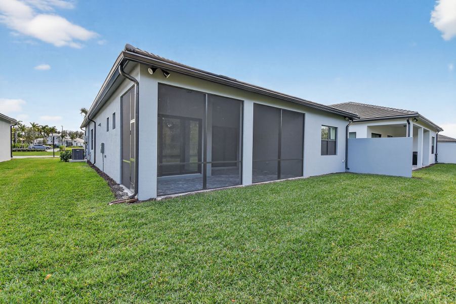 Exterior details and patio area of a home in Greyhawk Landing, Lake Worth (Image 28).