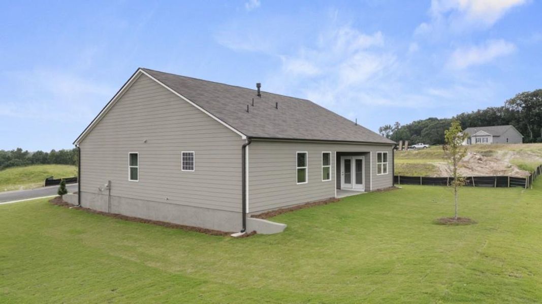 Exterior details and patio area of a home in Liberty Crossing, Braselton (Image 3).