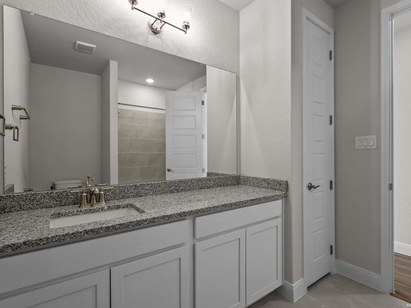 Furnished interior view inside a new home in Ladera, San Antonio (Image 33).