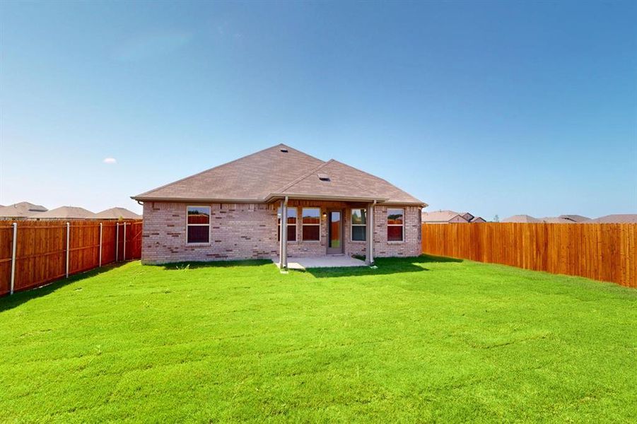 Front exterior of a new home in Verandah, Royse City, TX, highlighting curb appeal (Image 2).