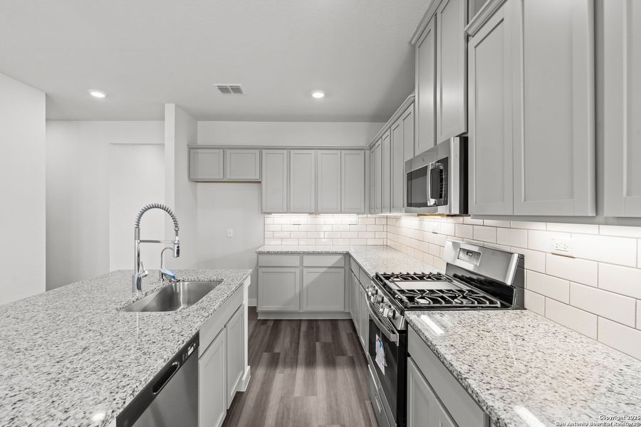 Furnished interior view inside a new home in The Meadows at Hunters Ranch, San Antonio (Image 11).