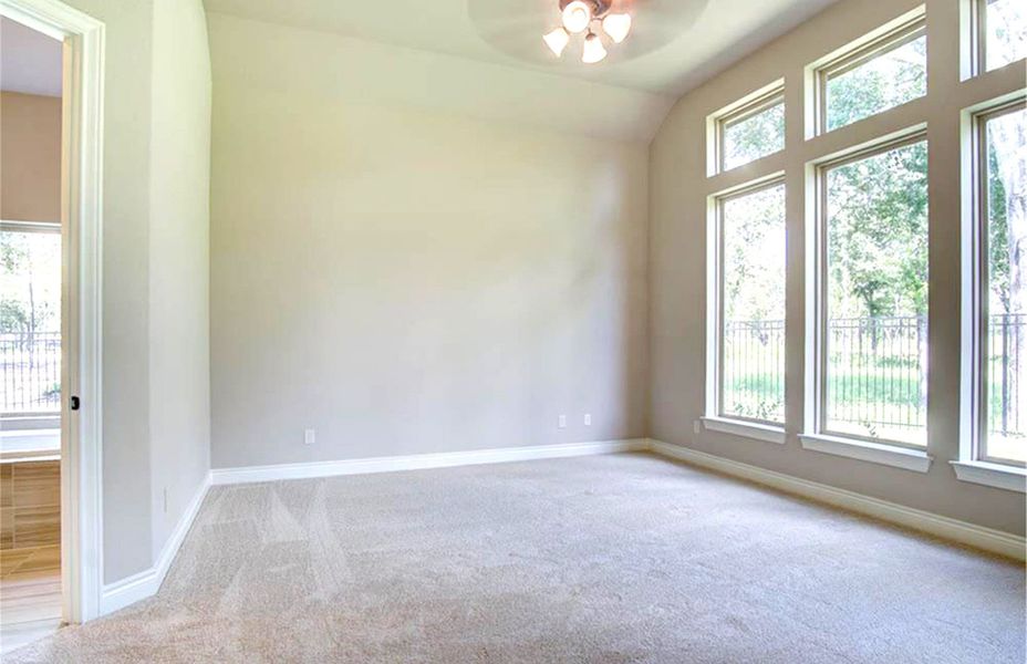 Representative unfurnished interior of a home built from the 4198 by Ravenna Homes in The Woodlands Hills 65′, Willis (Image 25).
