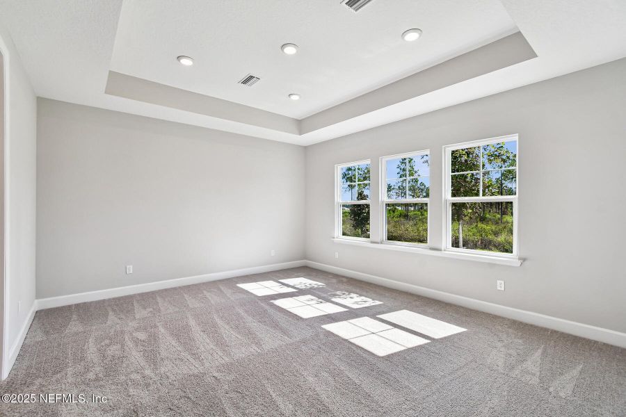 Spacious, unfurnished interior of a new home in Tributary 70', Yulee (Image 21).