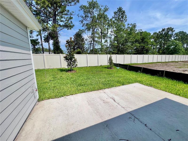 Front exterior of a new home in Whiteview Village, Palm Coast, FL, highlighting curb appeal (Image 2).