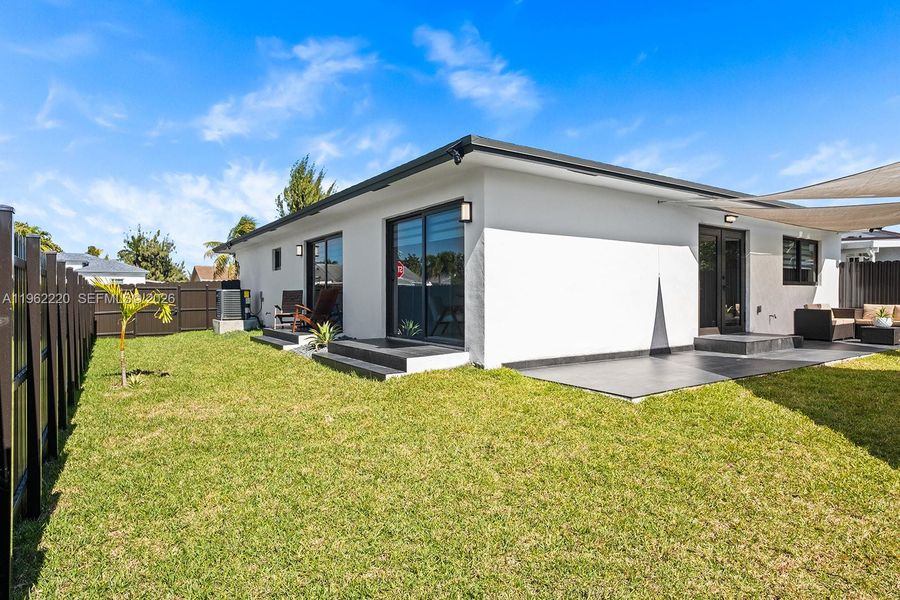 Exterior details and patio area of a home in , Miami (Image 25). Exterior details and patio area of a home in , Miami (Image 25).