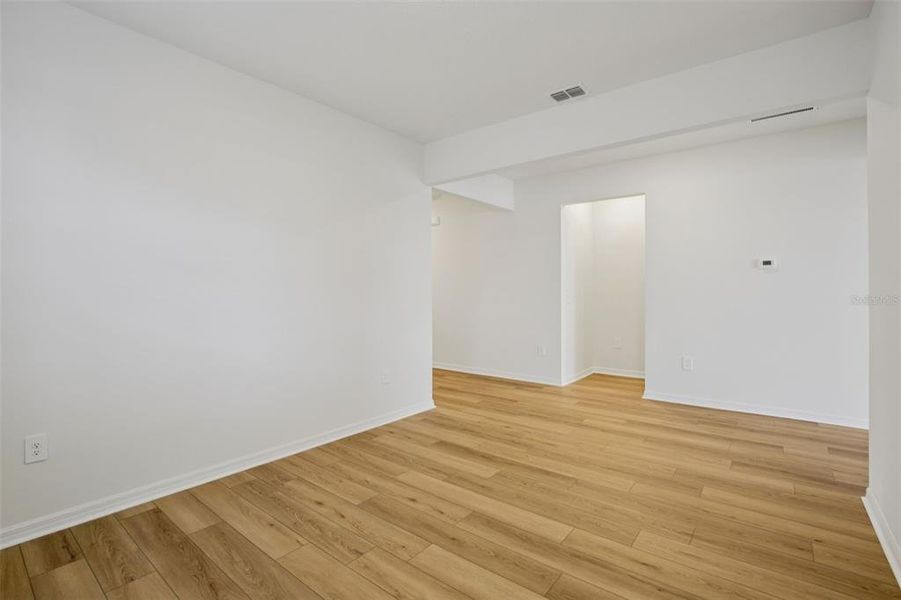 Spacious, unfurnished interior of a new home in Coasterra - Reserve Series, Palmetto (Image 40).