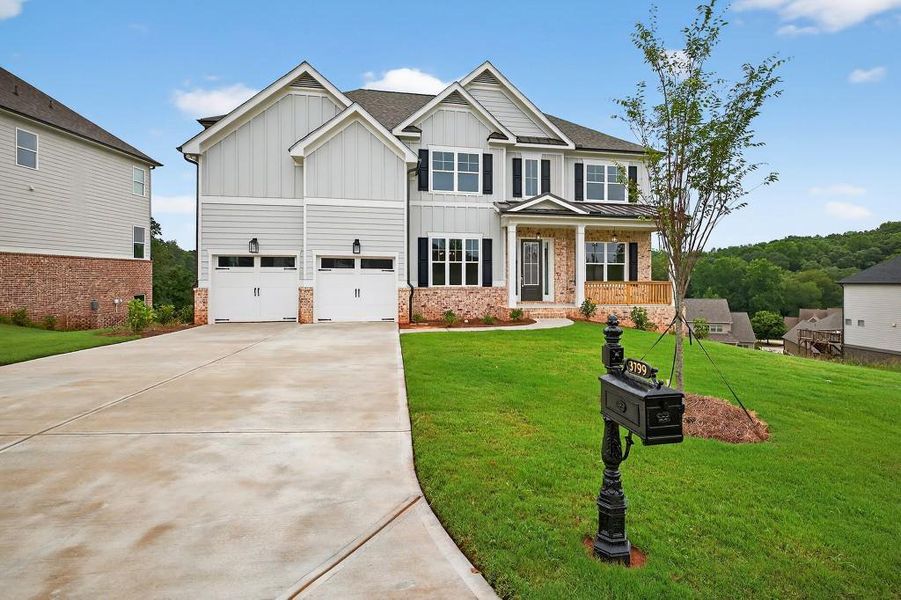 Front exterior of a new home in Traditions Of Braselton, Jefferson, GA, highlighting curb appeal (Image 25). Front exterior of a new home in Traditions Of Braselton, Jefferson, GA, highlighting curb appeal (Image 25).