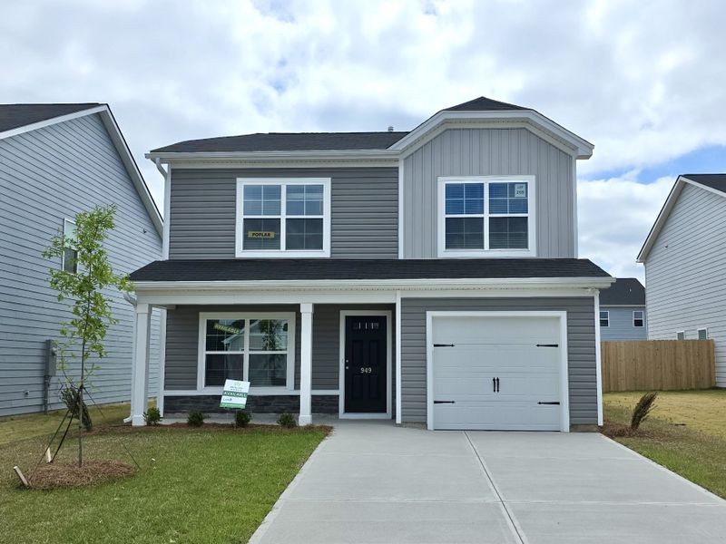Front exterior of a new home in Rivers Crossing, Aiken, SC, highlighting curb appeal (Image 2). Front exterior of a new home in Rivers Crossing, Aiken, SC, highlighting curb appeal (Image 2).