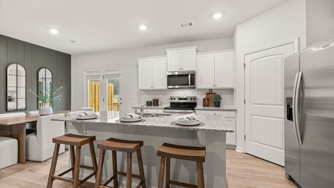 Representative furnished interior of a home built from the Sudbury 24' Townhome by D.R. Horton in Mountain Park, Dahlonega (Image 6).