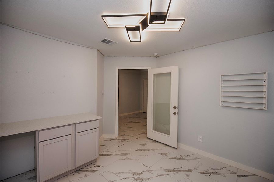 Office has great storage and even a spot for a mini fridge. Office has great storage and even a spot for a mini fridge.