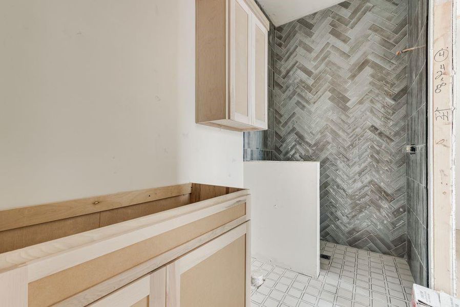 this 4th bathroom is an ensuite bath but is also has guest access.