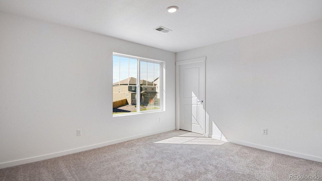 Spacious, unfurnished interior of a new home in Sky Ranch, Watkins (Image 25).