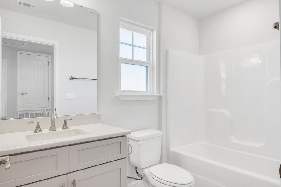 Representative furnished interior of a home built from the Plan 1817 by Adams Homes in Pine Top, Cantonment (Image 8).