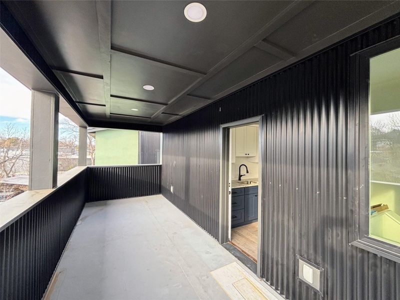 Balcony featuring a sink