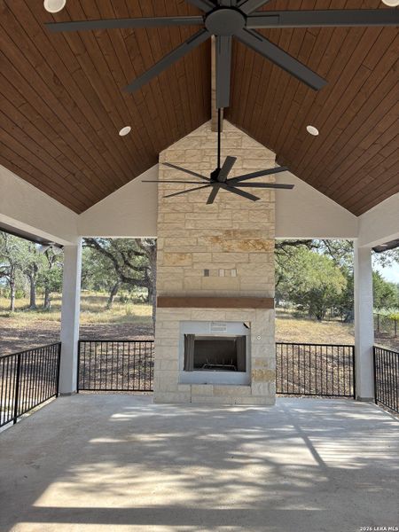Exterior details and patio area of a home in , New Braunfels (Image 26).