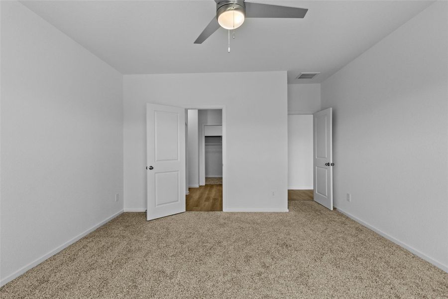 Spacious, unfurnished interior of a new home in Sunterra, Katy (Image 26). Spacious, unfurnished interior of a new home in Sunterra, Katy (Image 26).