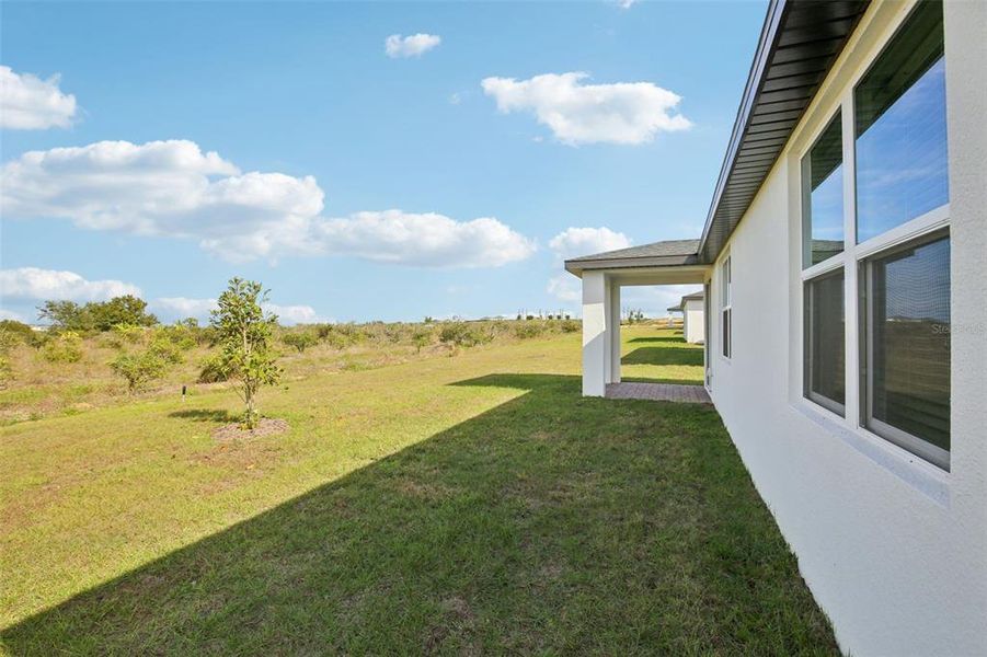Exterior details and patio area of a home in Hamilton Bluff - Signature Series, Lake Hamilton (Image 27).
