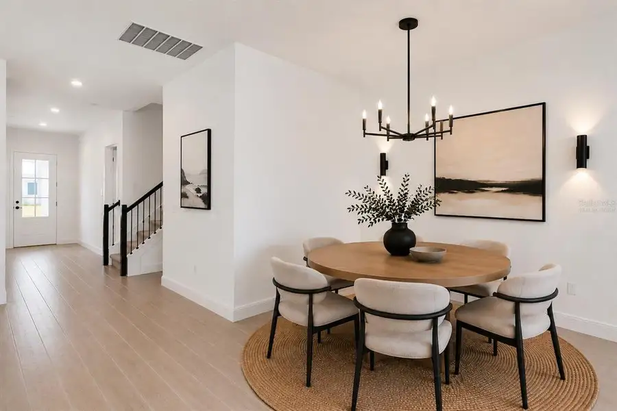 Furnished interior view inside a new home in Laureate Park, Orlando (Image 7).