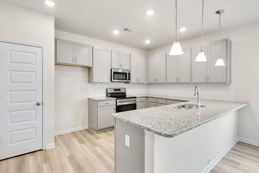 Furnished interior view inside a new home in Sanders Park, Austell (Image 5).