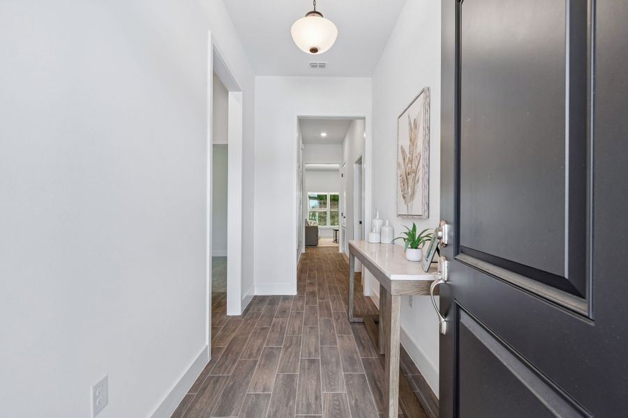 Furnished interior view inside a new home in Abbey Glen, Dade City (Image 6).