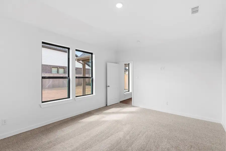 Private main bedroom located at the back of the house