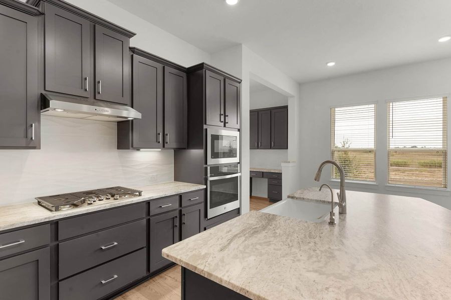 Furnished interior view inside a new home in The Grove at Blackhawk, Pflugerville (Image 10). Furnished interior view inside a new home in The Grove at Blackhawk, Pflugerville (Image 10).