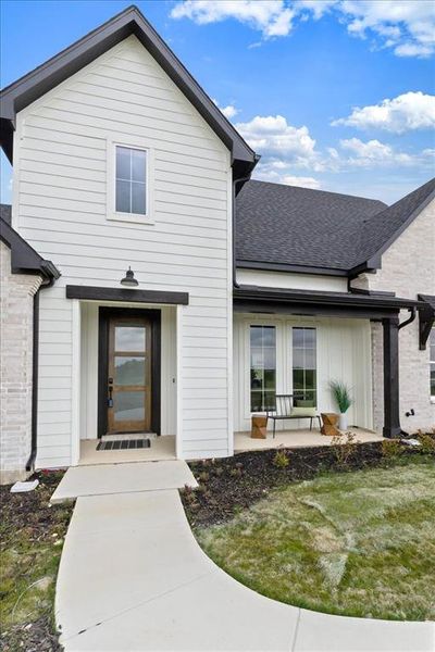 Exterior details and patio area of a home in , Justin (Image 4).