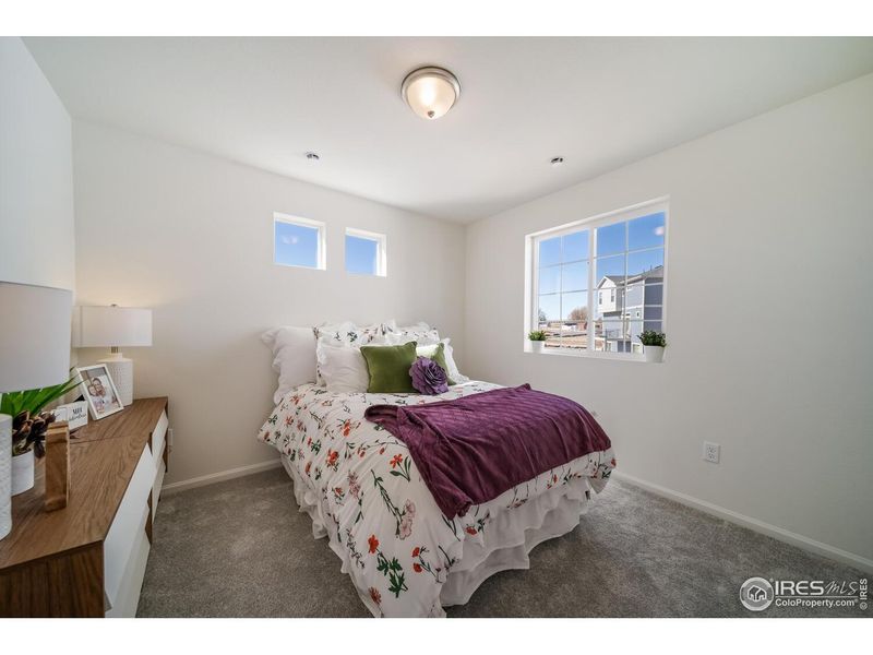 Furnished interior view inside a new home in Thompson River Ranch, Johnstown (Image 13).